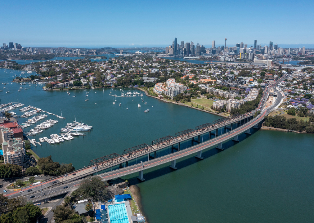 Aerial view of Iron Cove Bridge with Sydney in background