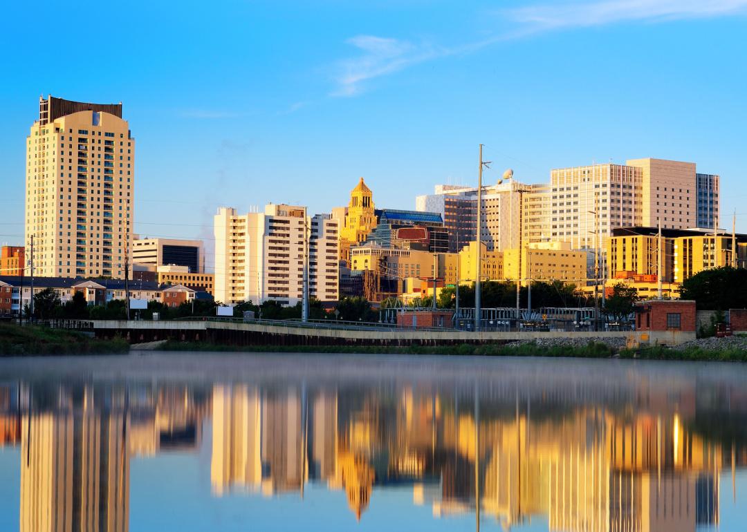 Rochester skyline reflected in river.