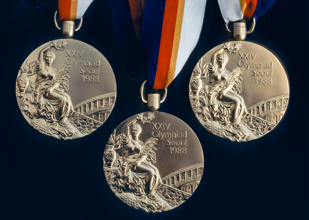 A close-up view of an Olympic gold medal awarded during the 1988 Olympic Games.