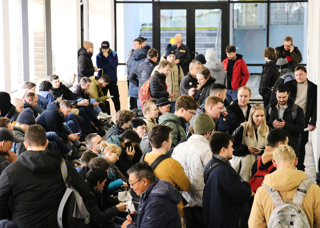 Russian citizens waiting in Kazakhstan public service center to get an ID number.