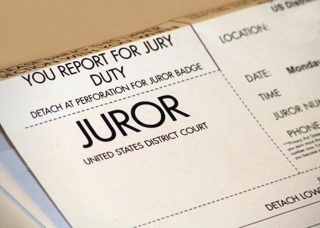 Jury duty summons and badge