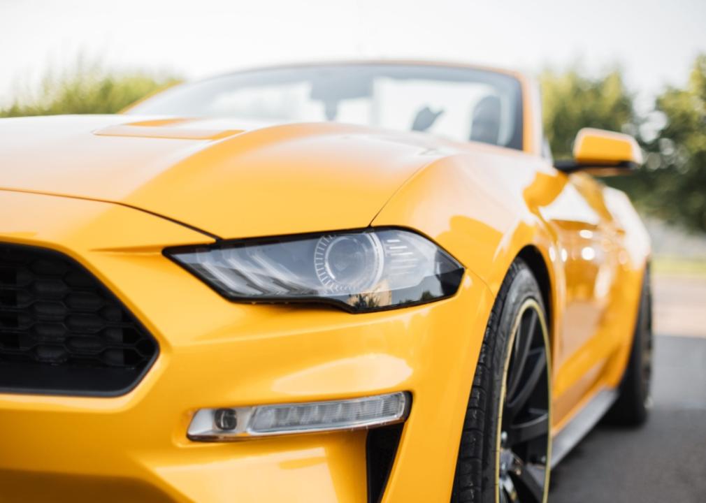 A yellow Ford Mustang.