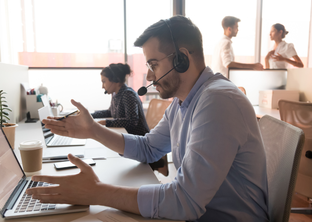 Telemarketer speaking with client