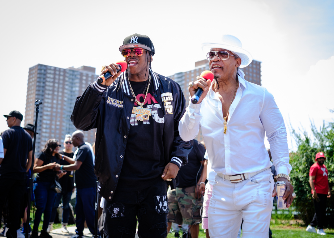Scorpio and Grandmaster Melle Mel of The Furious Five perform onstage.