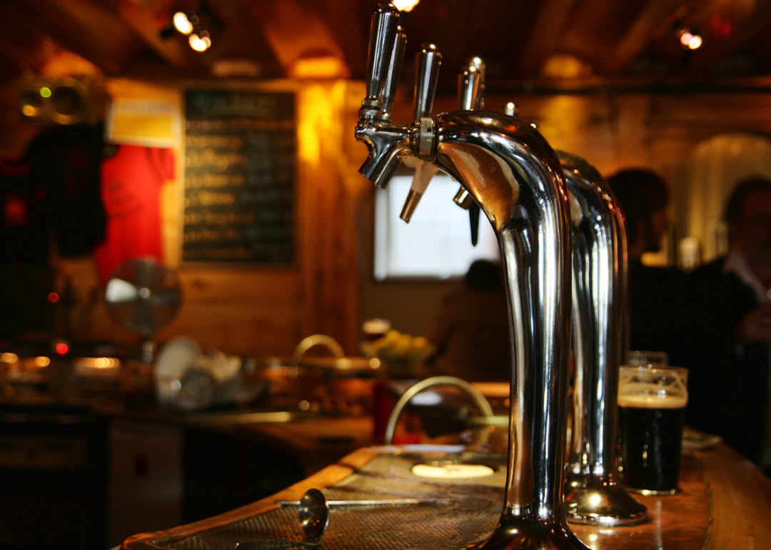 Beer taps in a bar.