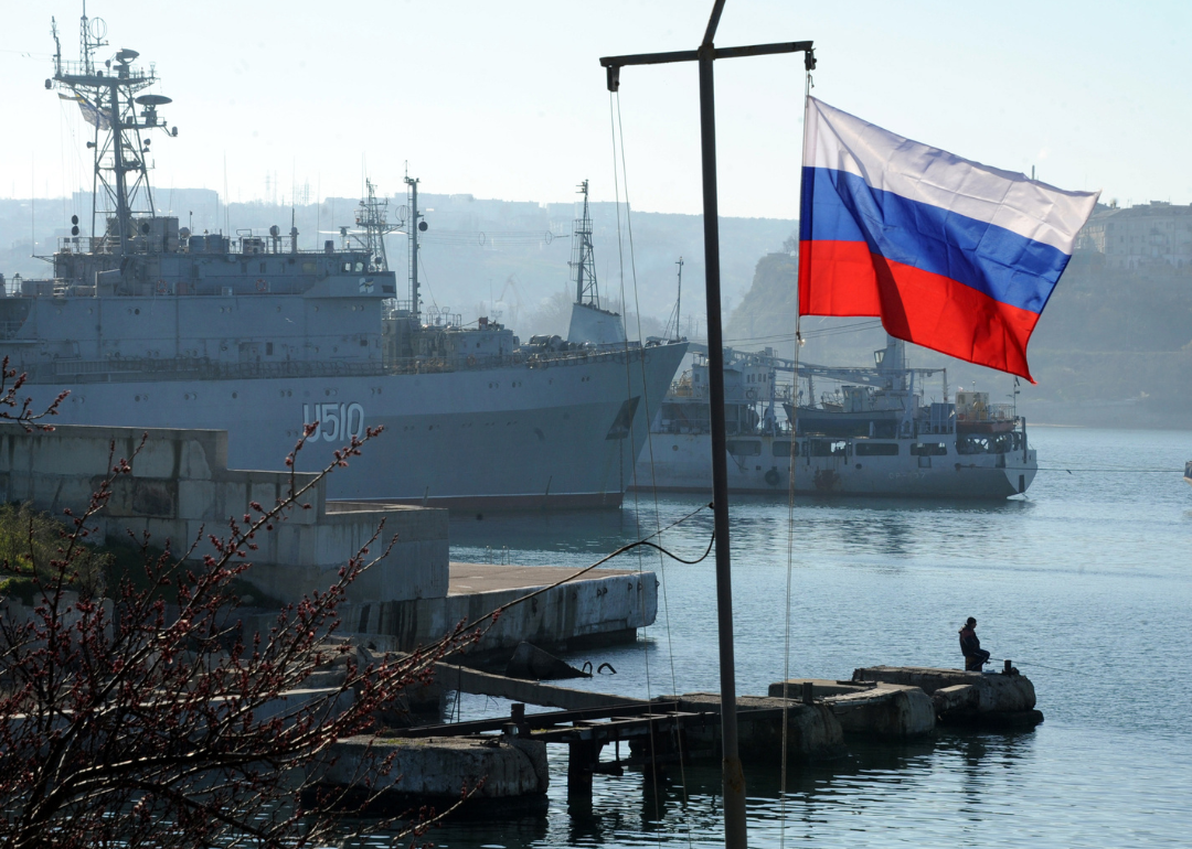 The Russian flag waves in front of the Ukrainian military ship in Sevastopol.