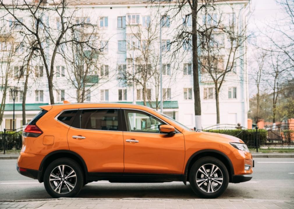 A small orange SUV.