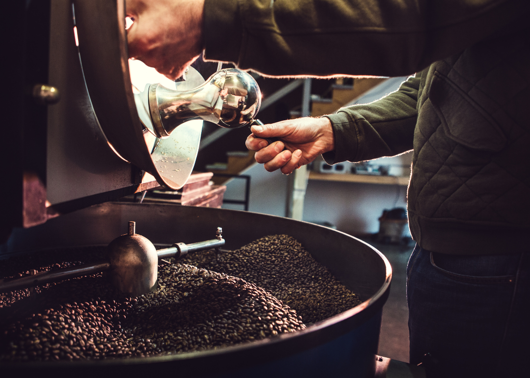 Coffee roaster preparing beans.