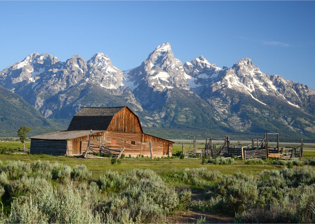Historic barn with Grand Tetons in the background.