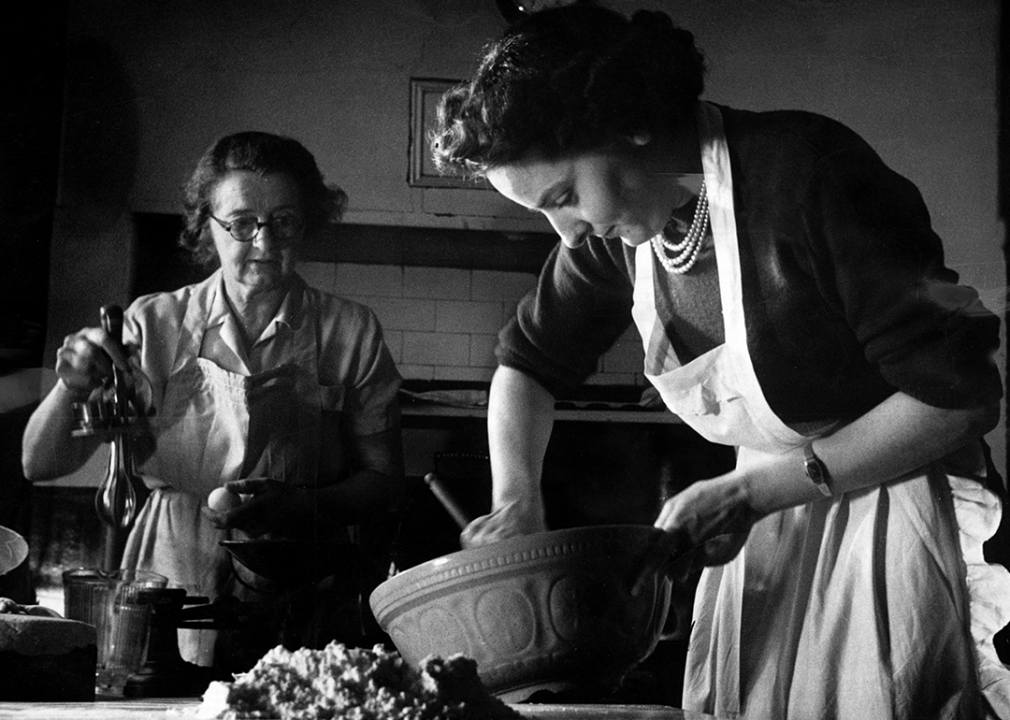 Two women preparing Christmas recipes.