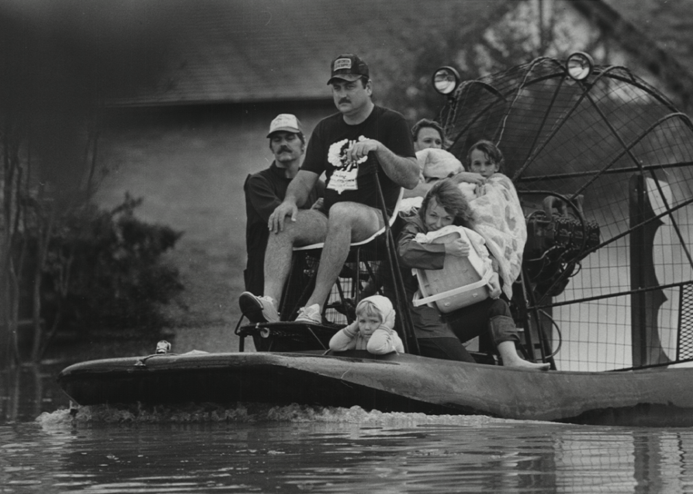 Family rescued from flooding by air-boat in Houston.