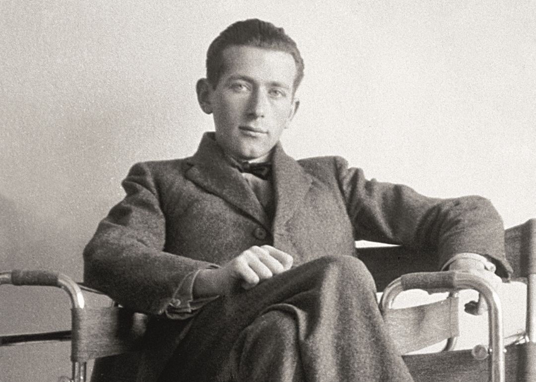 Marcel Breuer seated in the Wassily chair.