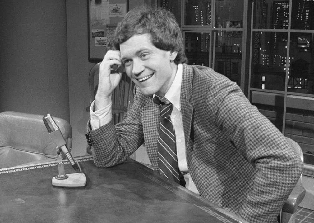 David Letterman smiles as he hosts the premiere of his talk show.