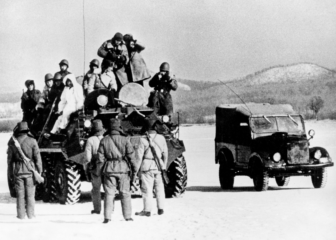 Soviet military on APC at the frozen Ussuri; facing chinese border troops
