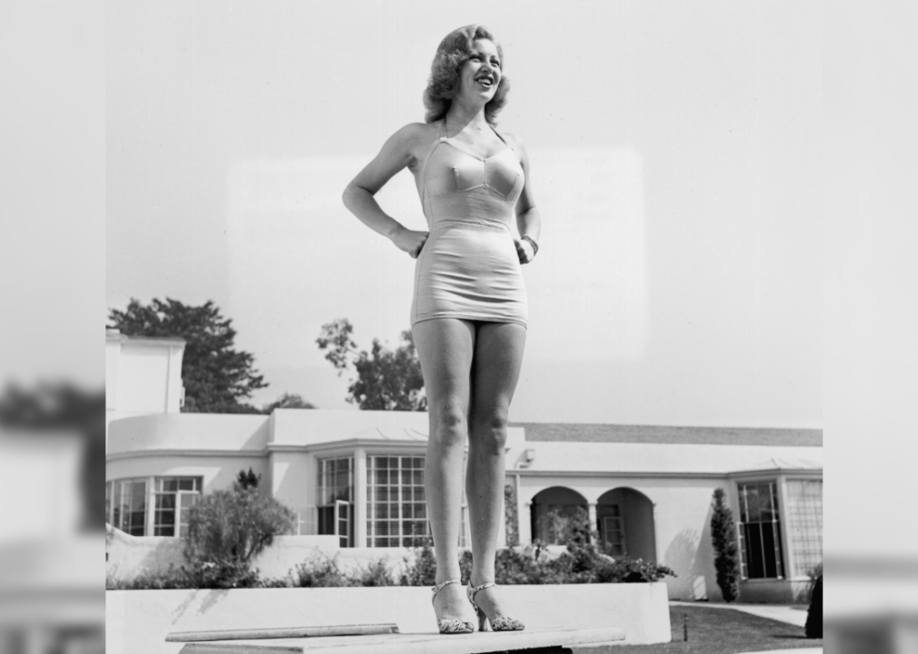 Lana Turner wearing a swimsuit at her Sunset Plaza Apartment complex.