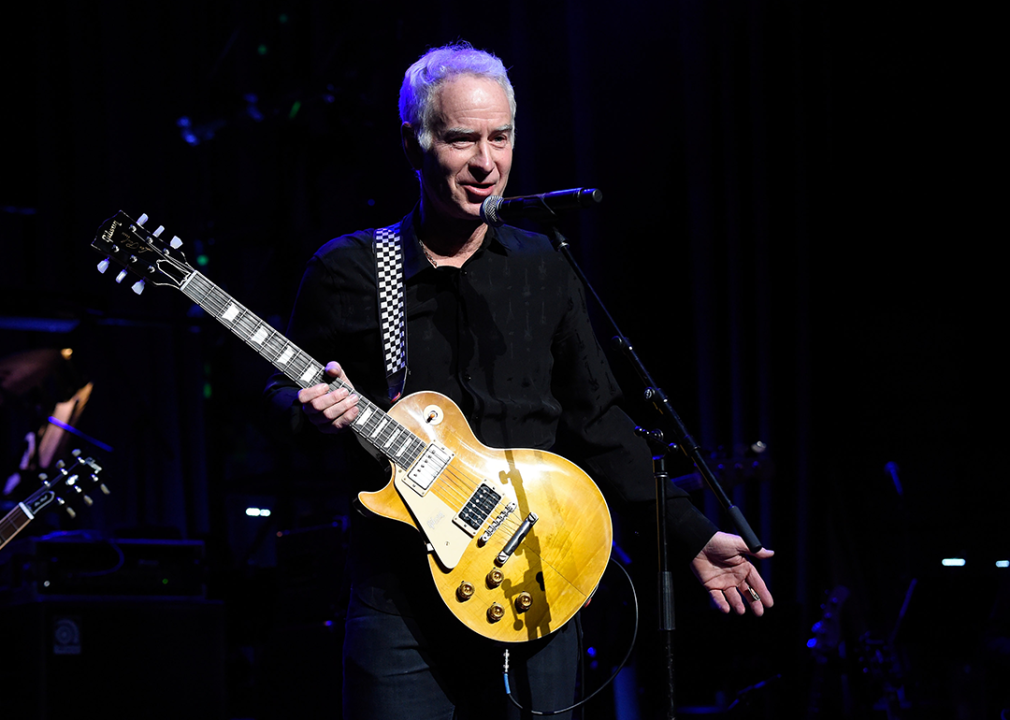 John McEnroe performs on stage at the Second Annual ‘LOVE ROCKS NYC!’.