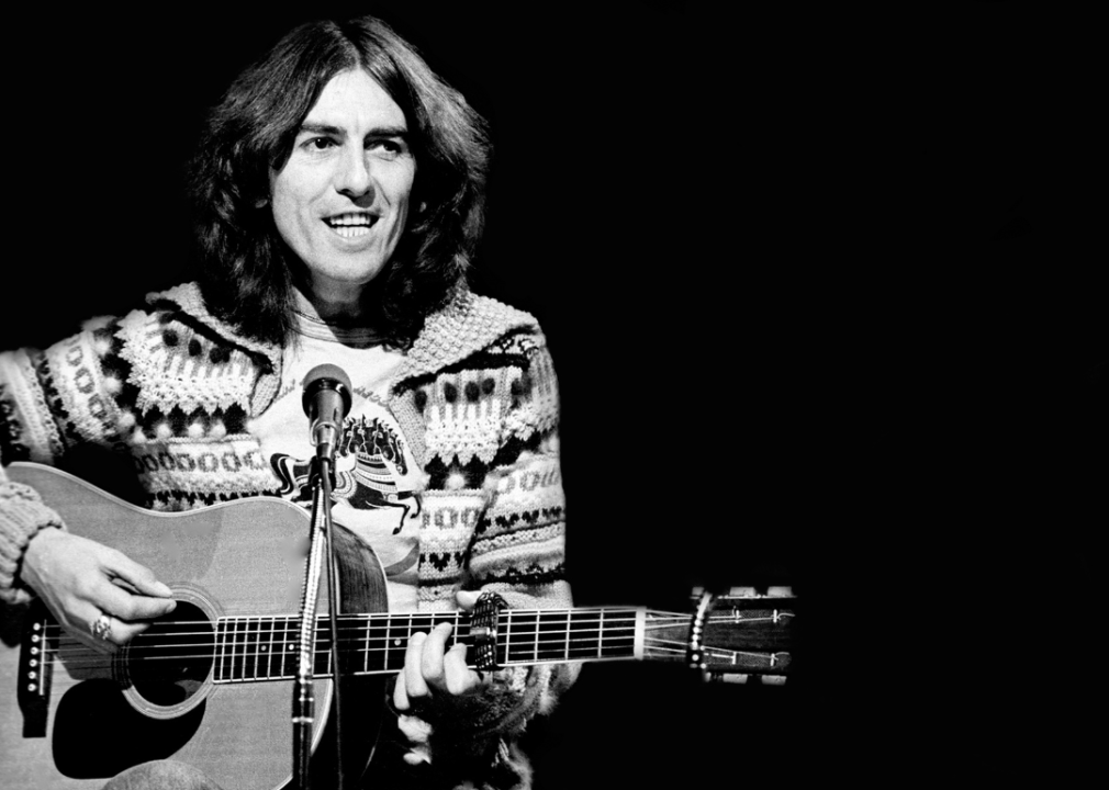 George Harrison sings with guitar