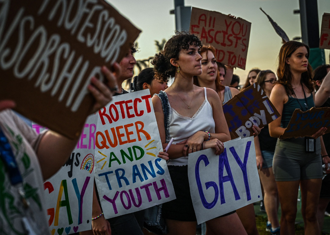 LGBTQ rights supporters protest against Florida Governor Ron DeSantis.
