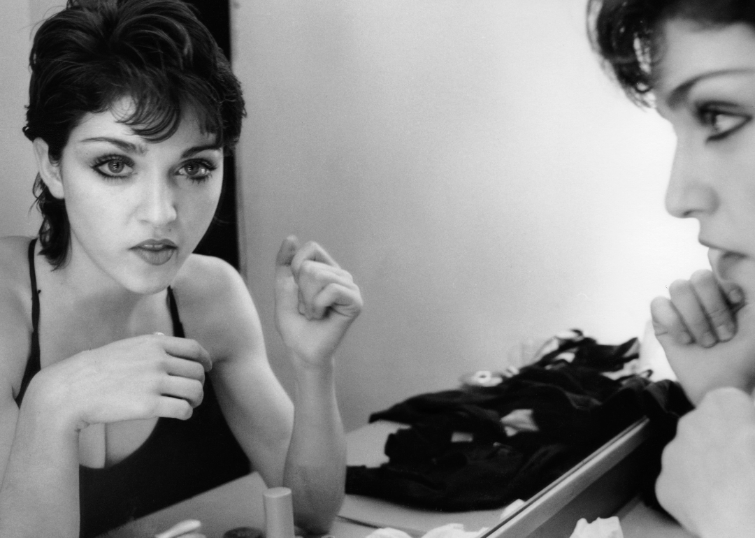 Madonna reflected in a dressing room mirror.