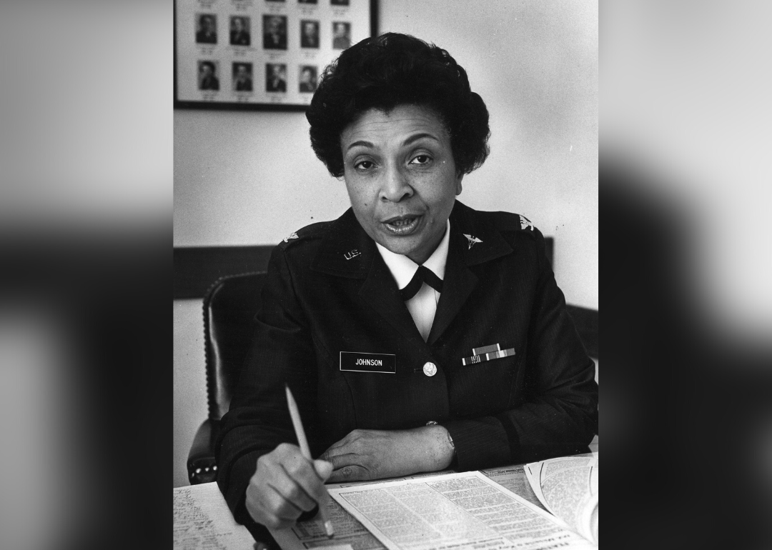 Hazel Johnson-Brown seated at desk.