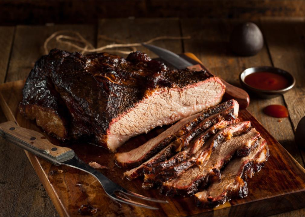 Brisket on a wooden cutting board. 