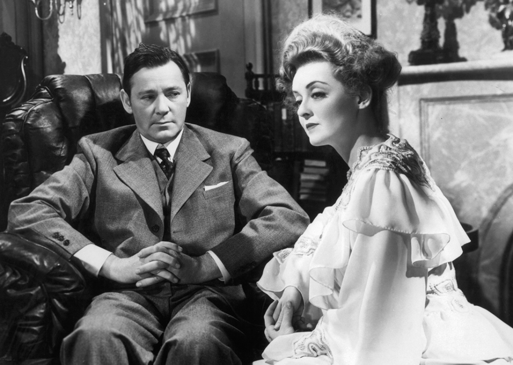 Herbert Marshall looking at Bette Davis in a scene from the film 
