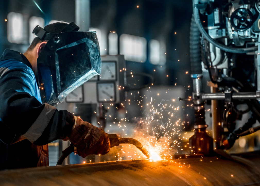 Welder working in factory