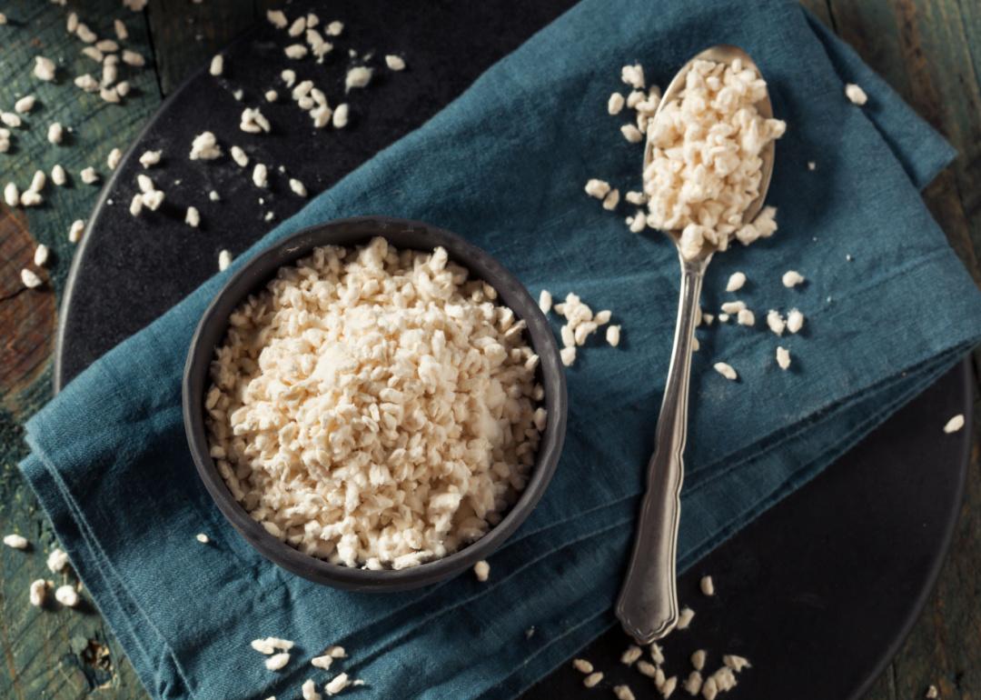 Raw organic white koi rice in bowl.