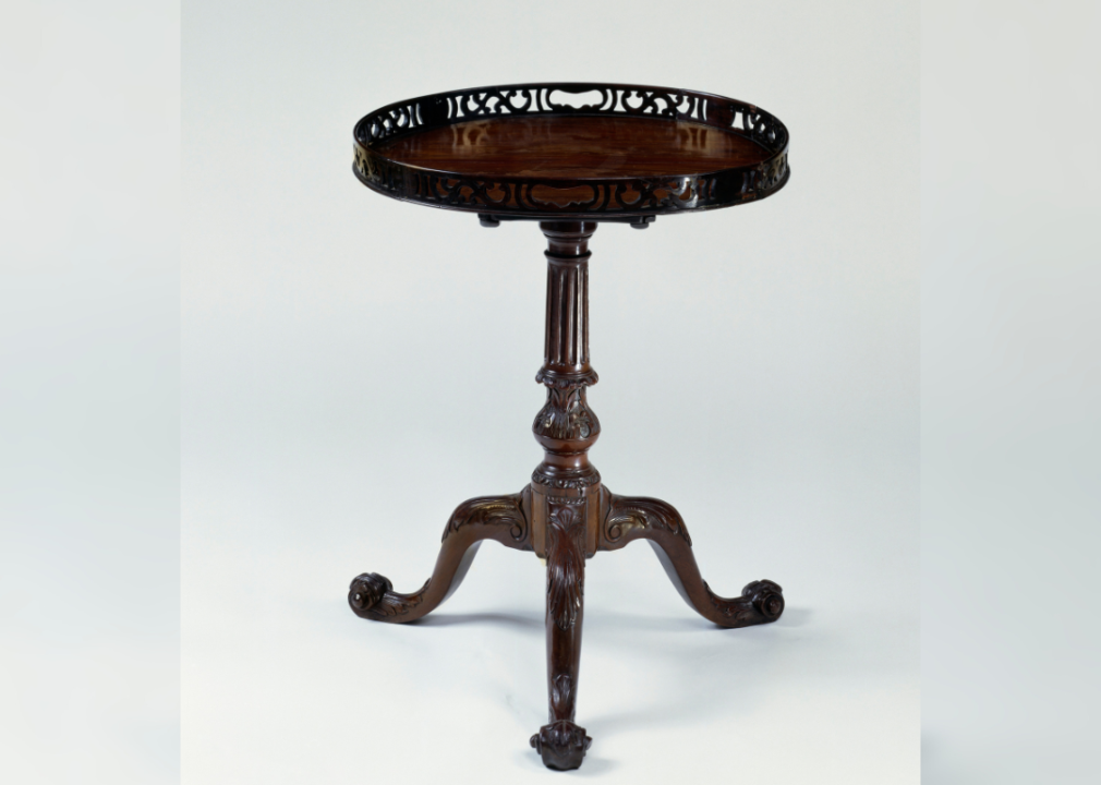 George III style mahogany three-legged table.