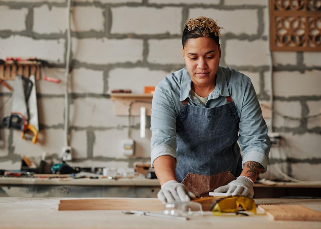 Female carpenter in workshop.