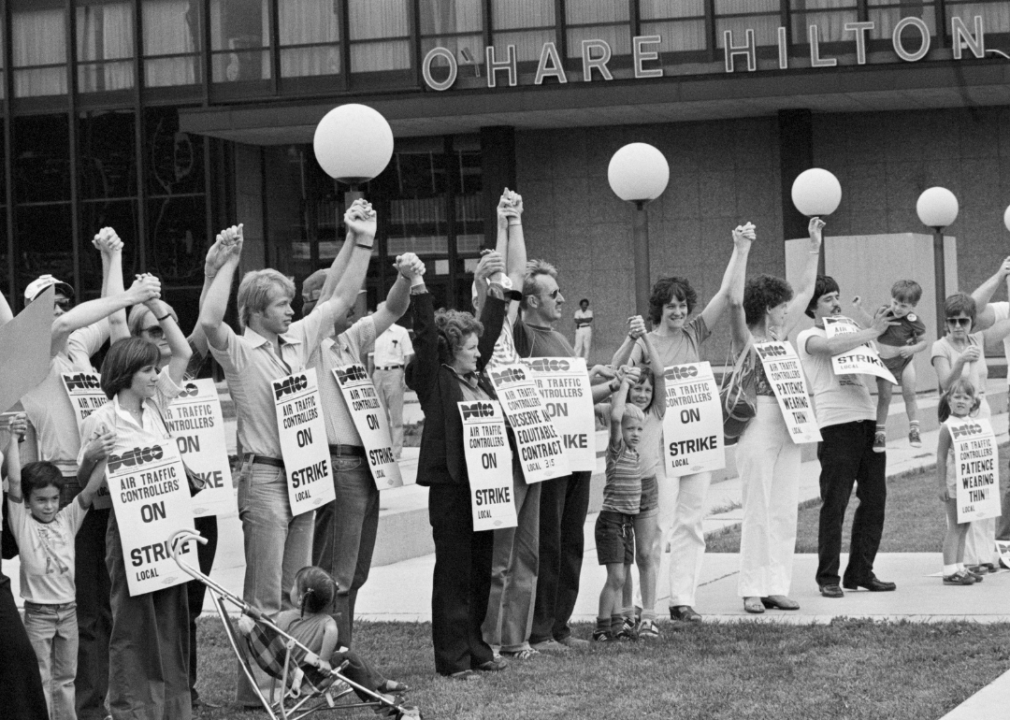 Striking members of air traffic controllers union outside Chicago airport