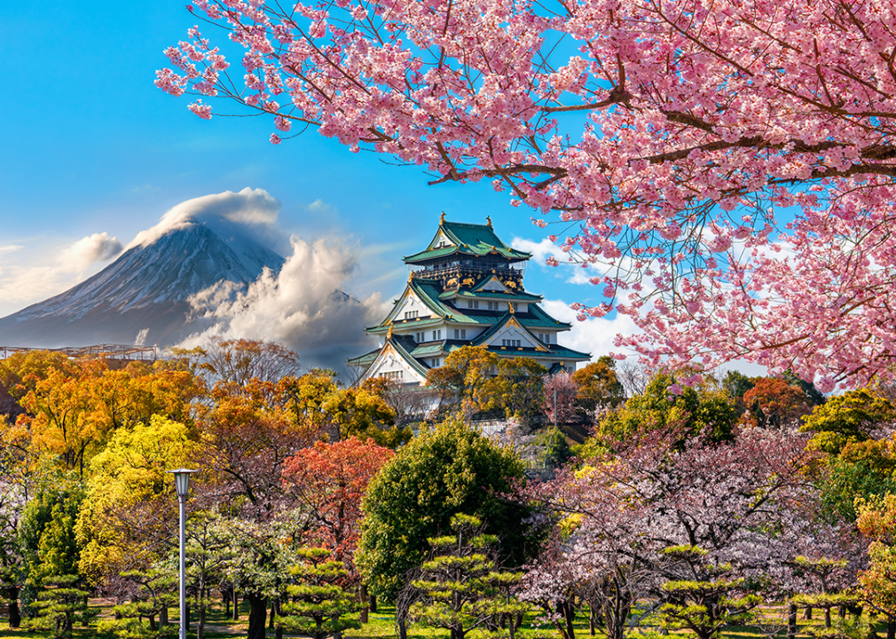 #16. Osaka, Japan Osaka Castle in springtime with Mt. Fuji background.