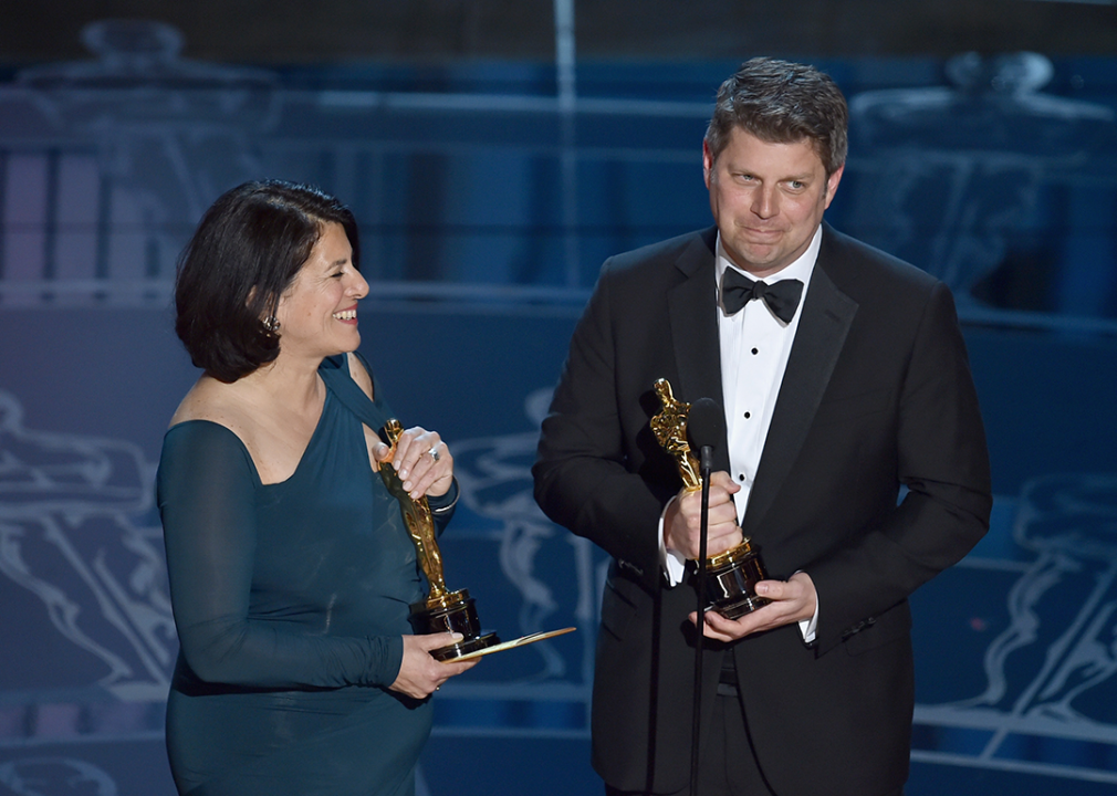 Adam Stockhausen and Anna Pinnock accept the Best Production Design Award for ‘The Grand Budapest Hotel’.