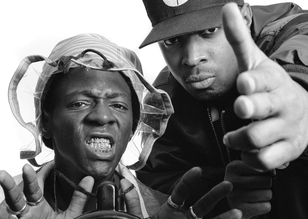 Flava Flav and Chuck D pose for a portrait.