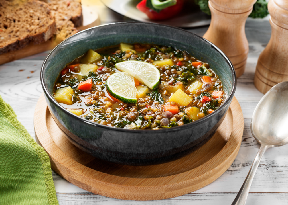 Bowl of lentil stew with kale