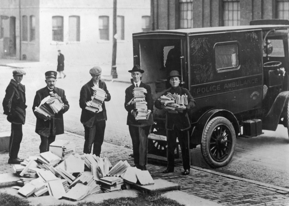 1918: Sedition Act used to quell World War I opposition Boston police with a haul of "subversive" literature, confiscated during the post-war red scare in 1919, which they are preparing to load into a police ambulance.