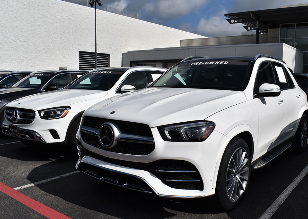 Selection of pre-owned Mercedes-Benz SUVs at dealership.