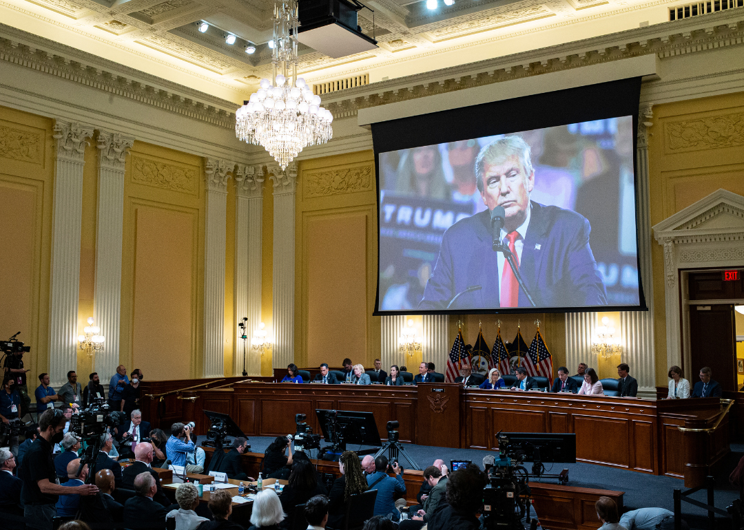 Former U.S. President Donald Trump is displayed on a screen during the fourth hearing on the January 6th investigation.