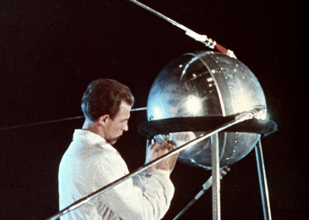 Soviet technician working on Sputnik 1.