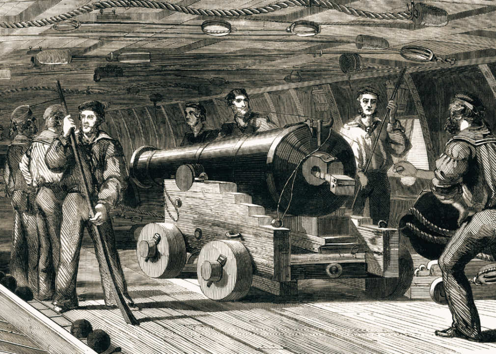 Illustration showing gun practice on board HMS Brilliant.