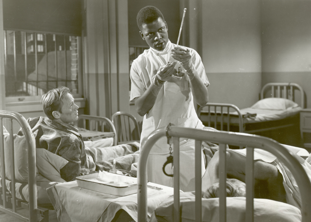 Sidney Poitier and Richard Widmark in a scene from ‘No Way Out’.