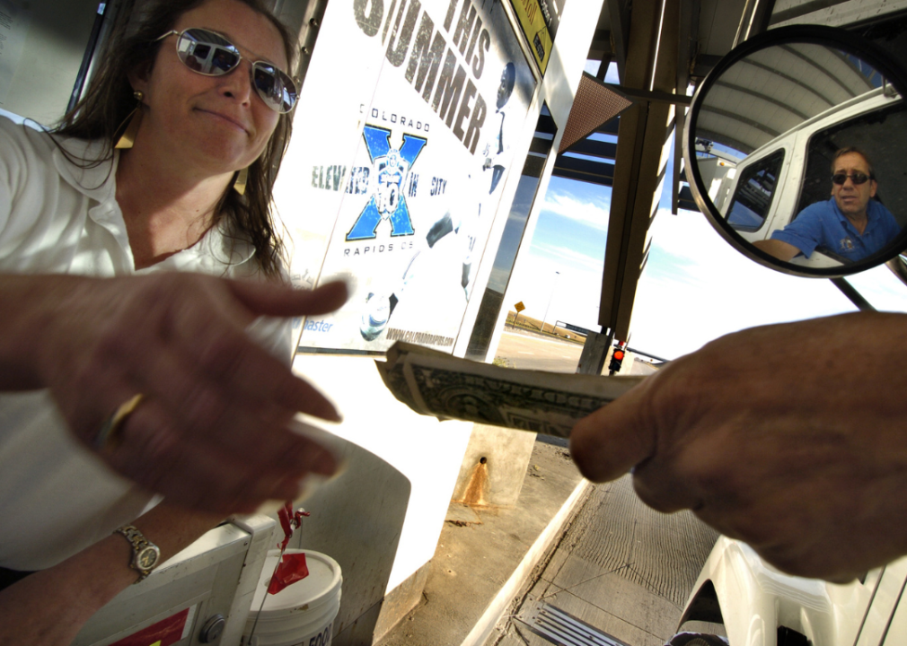 Toll attendant accepts payment