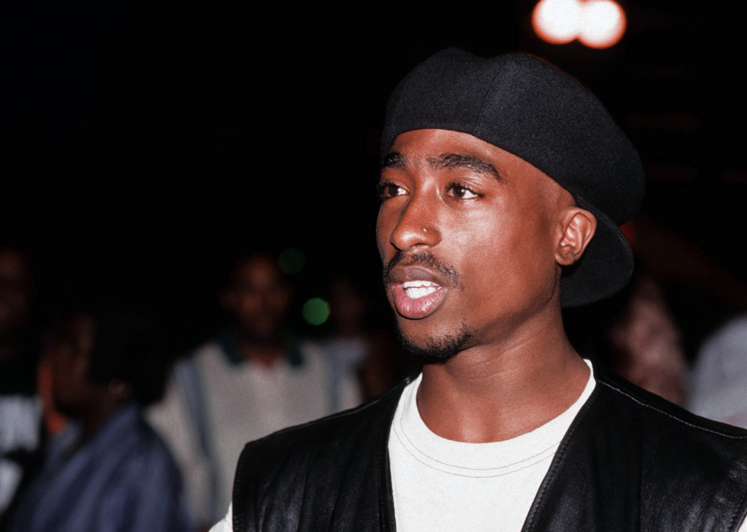 Tupac Shakur poses for a portrait.