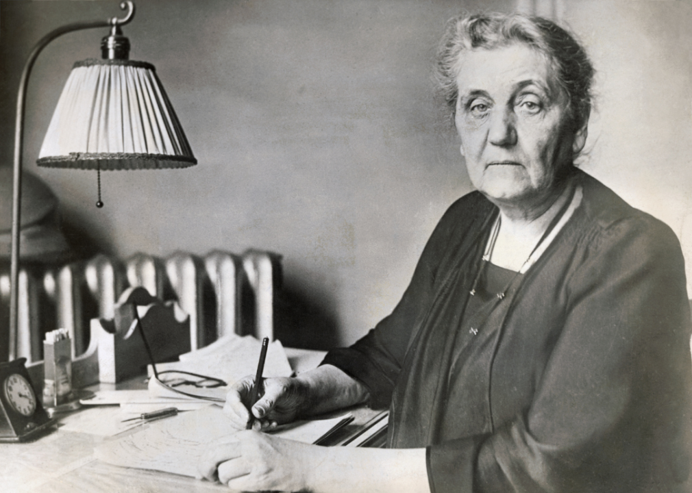 1920: American Civil Liberties Union was born Jane Adams sits at a desk, writing. She is an older woman with dowdy features.