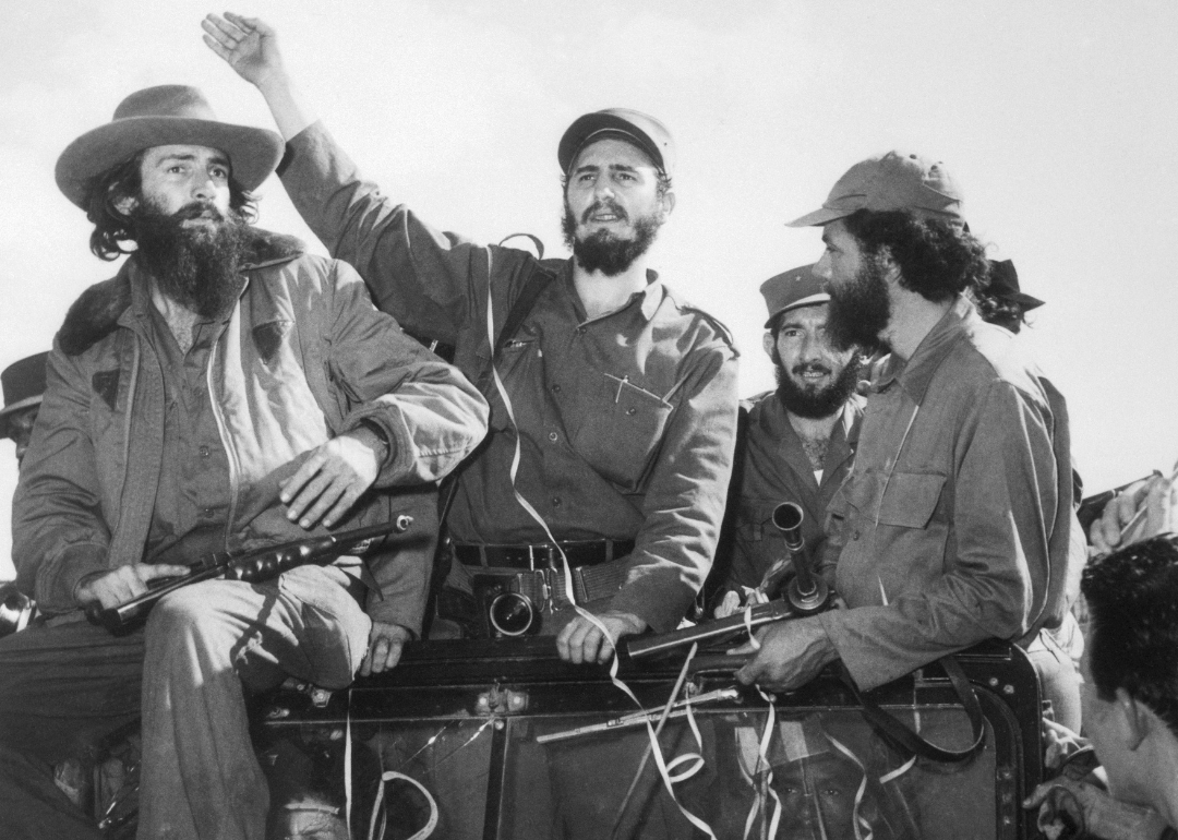 Fidel Castro waves to a cheering crowd.