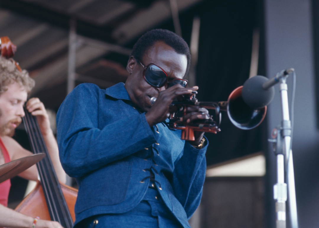 Miles Davis performing at the Newport jazz Festival.