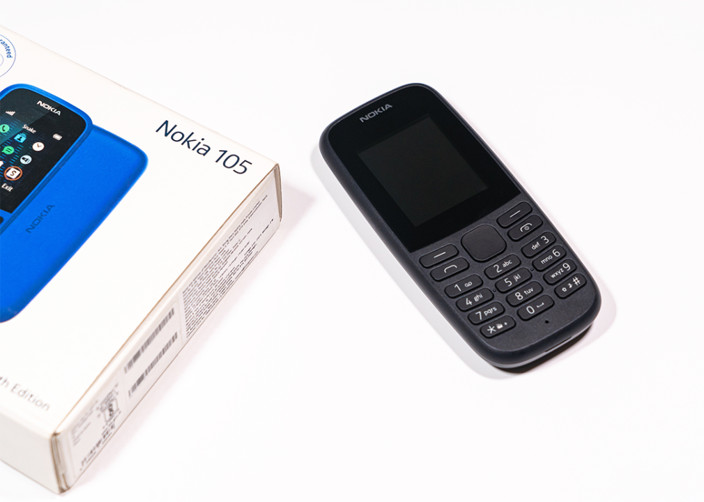 Nokia 105 phone and packaging on white background.