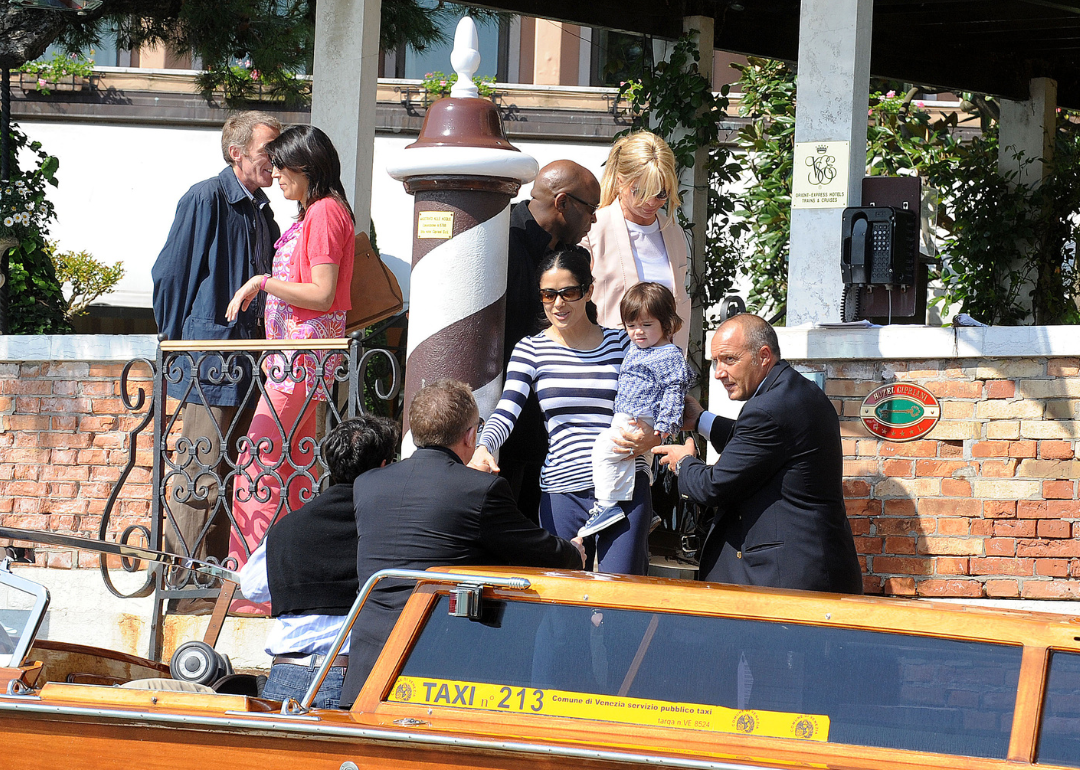 Salma Hayek, Francois-Henri Pinault and toddler daughter leave Cipriani Hotel in Venice.