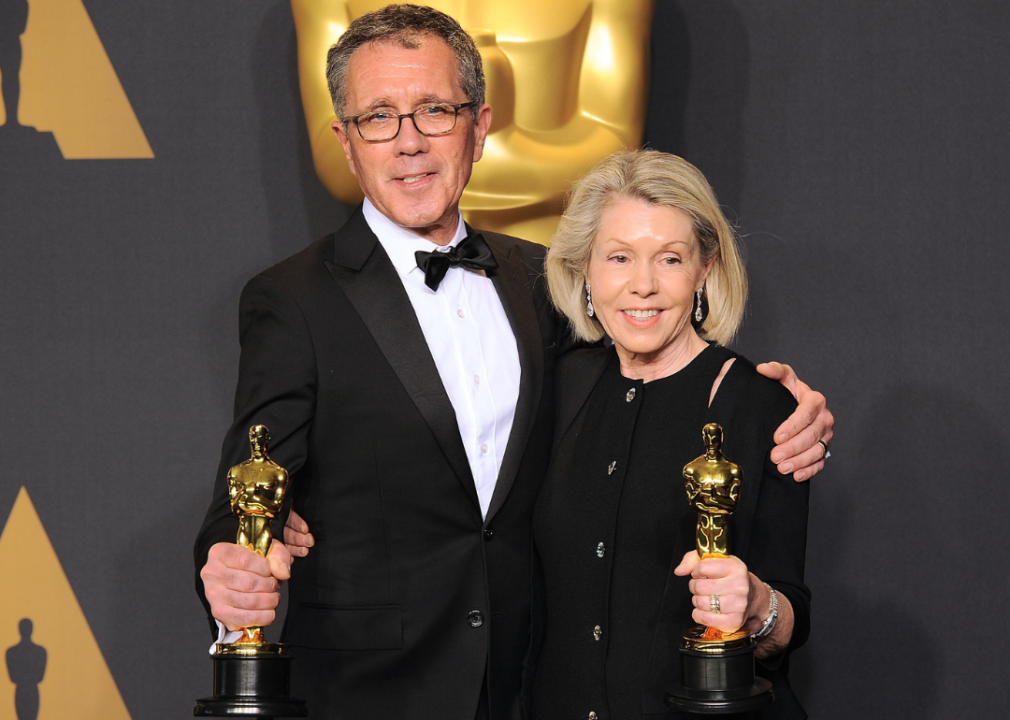 David Wasco and Sandy Reynolds-Wasco pose with their Oscar at Academy Awards.