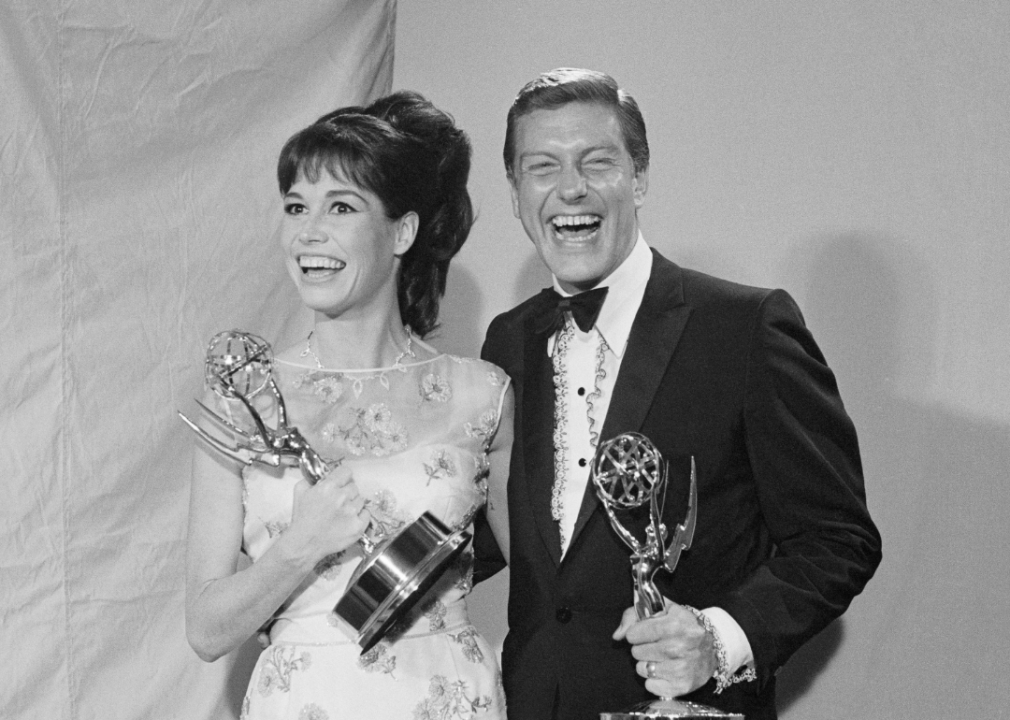 Mary Tyler Moore and Dick Van Dyke pose with Emmy Awards.